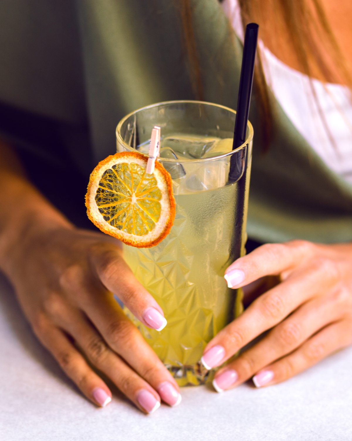 Bar service with a fresh citrus cocktail and lemonade