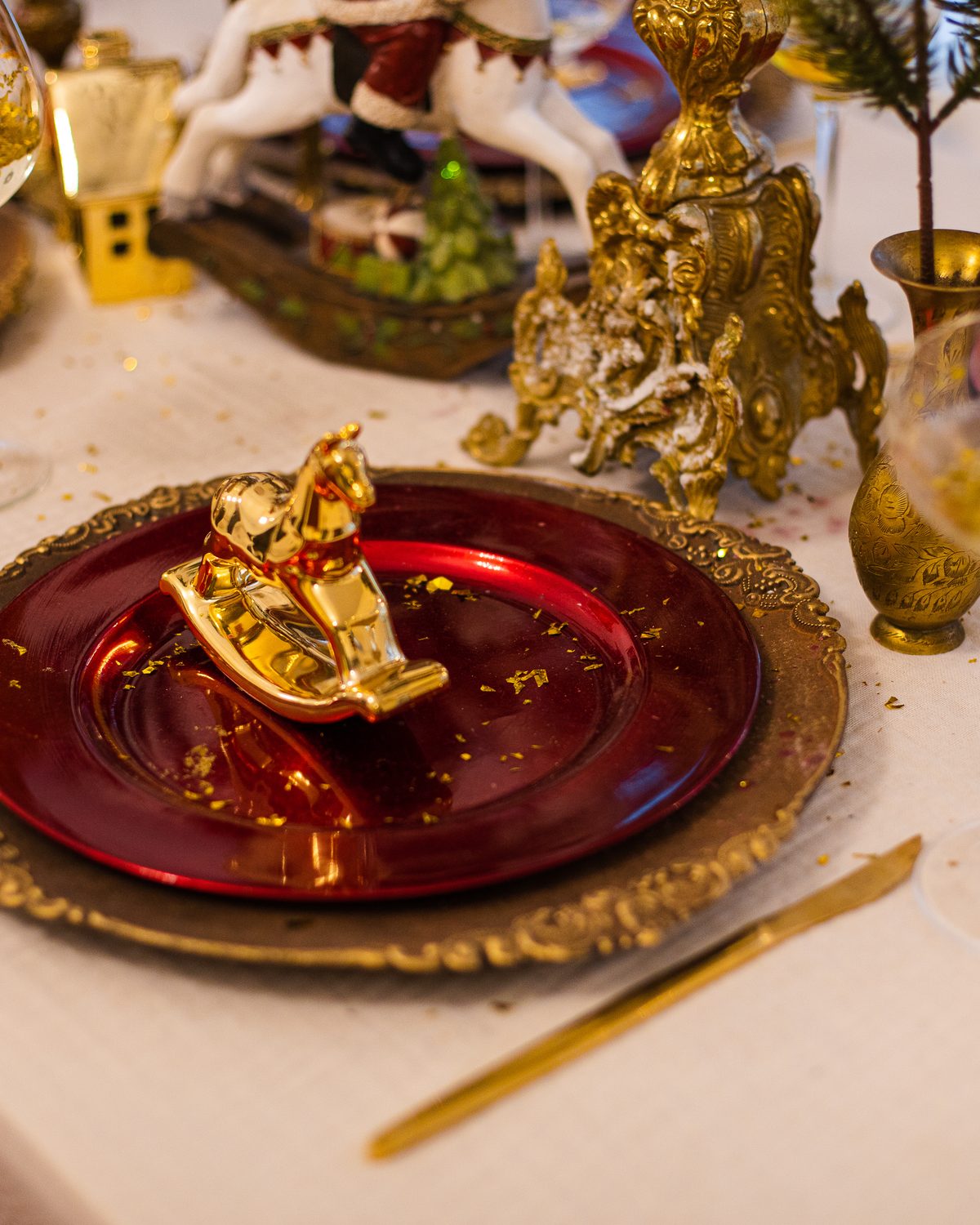Elegant festive table setting with gold accents and place settings